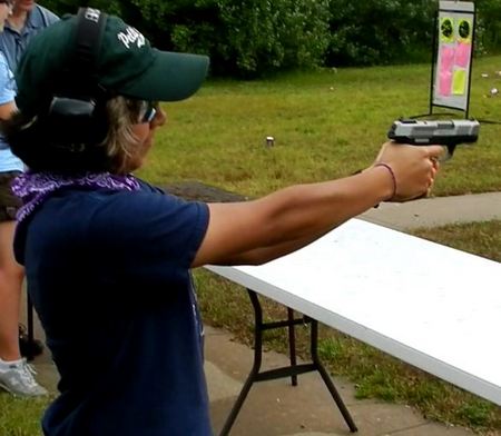 Female shooting the Ruger SR9C Pistol